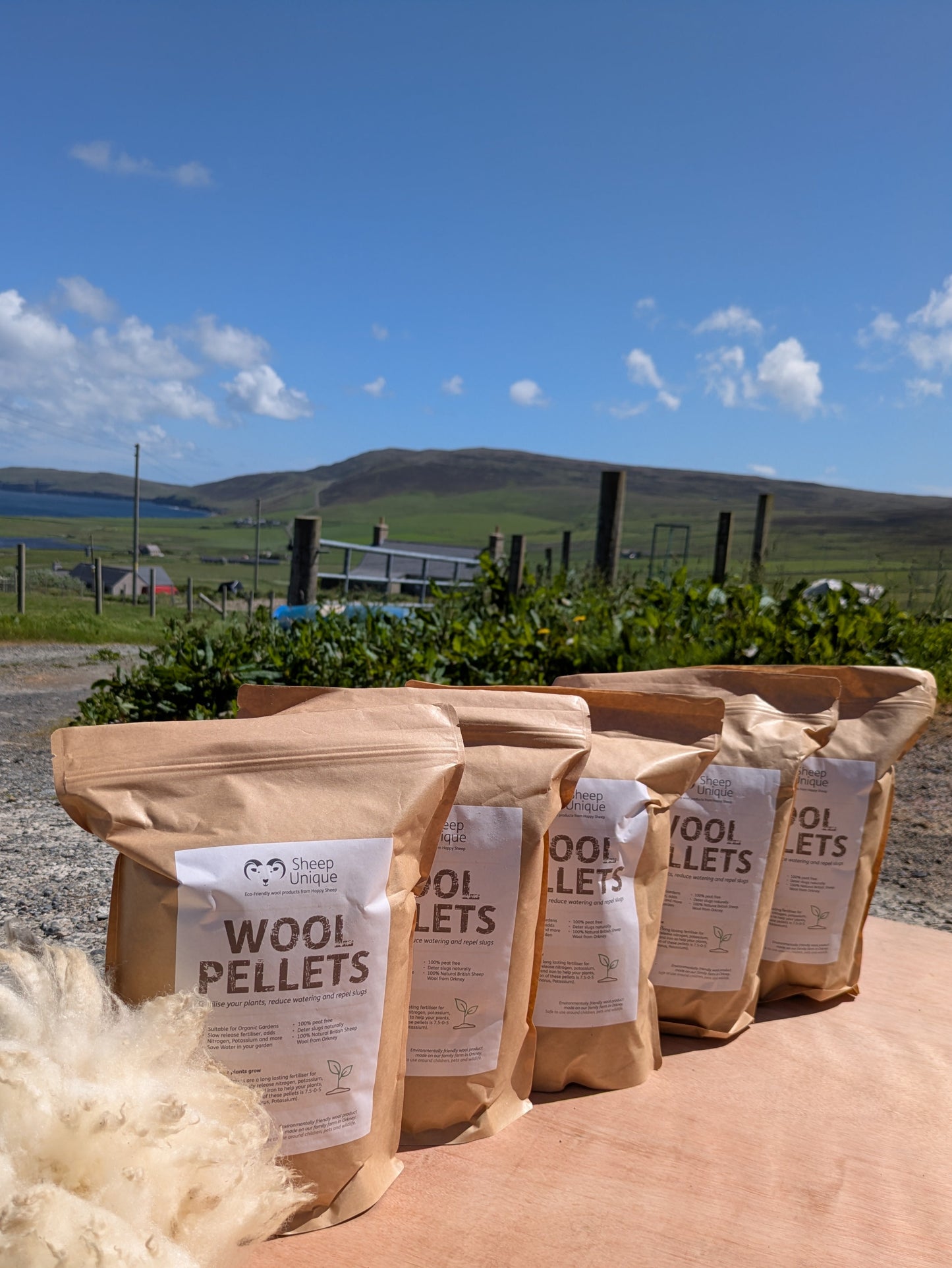 5 Bags of wool pellets with our Farm track as the background