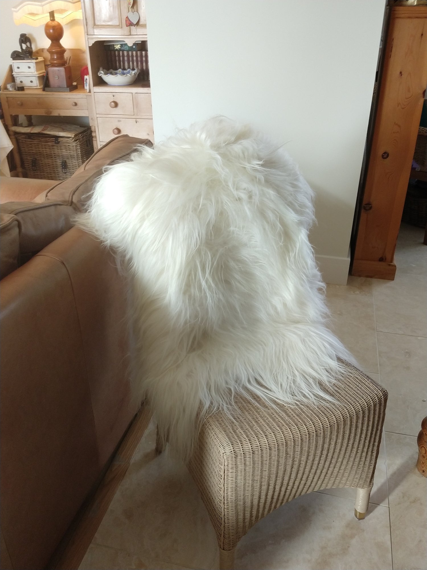 White lambskin rug showing the deep pile of the fur.